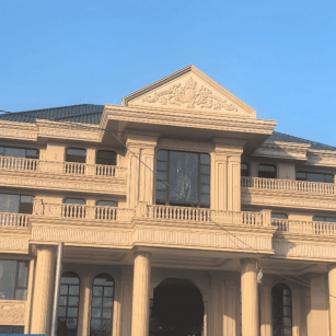 常州黄金麻别墅外墙干挂石材效果示例