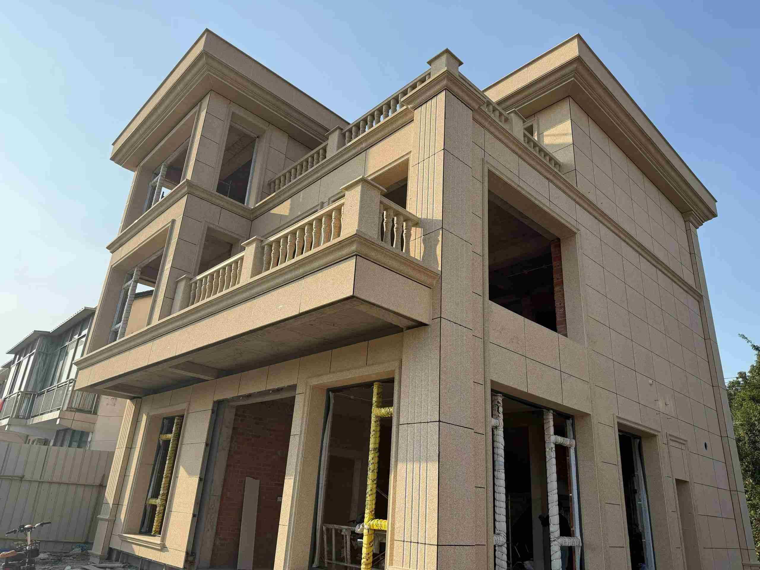 常州 黄金麻花岗岩石材荔枝面外墙干挂效果展示